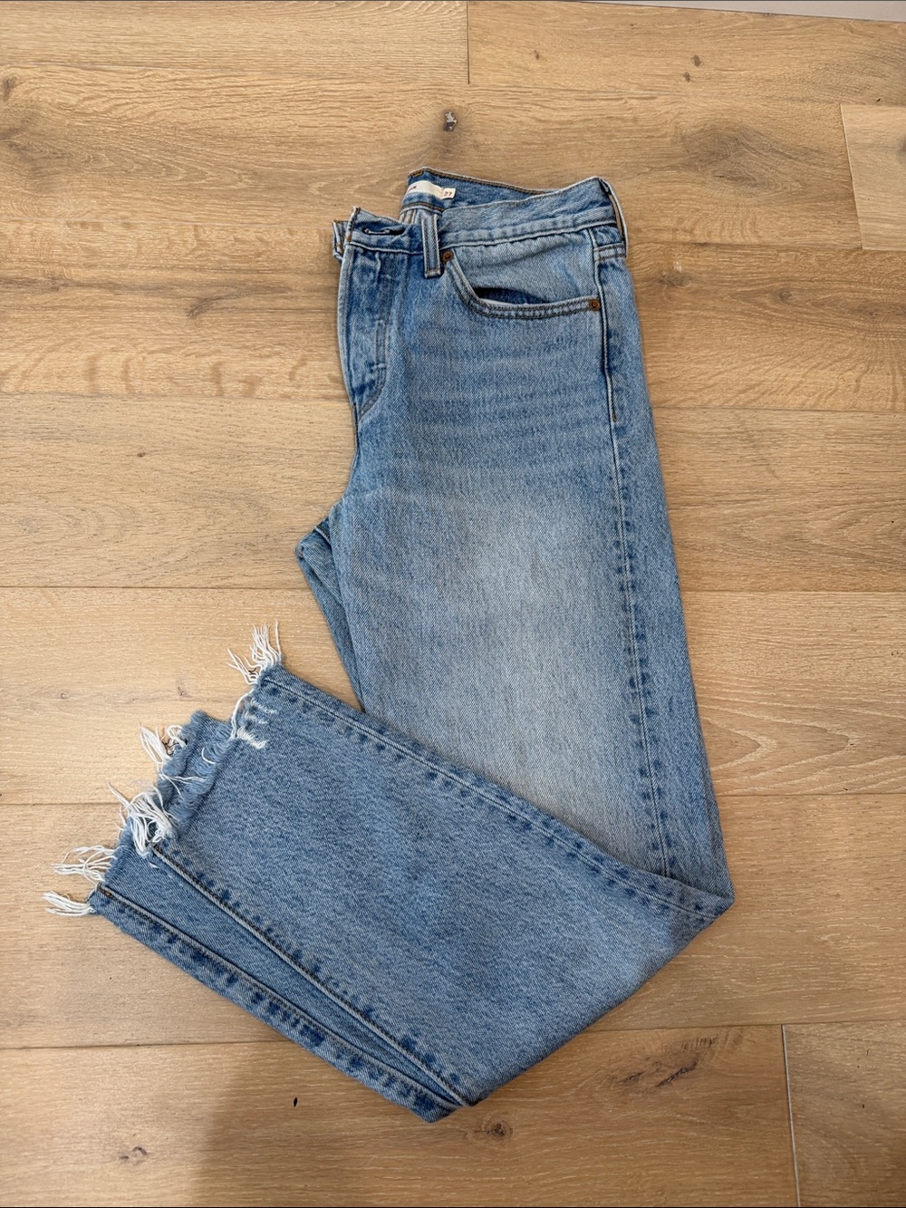Levi's Light Blue Straight Jeans with Frayed Hem